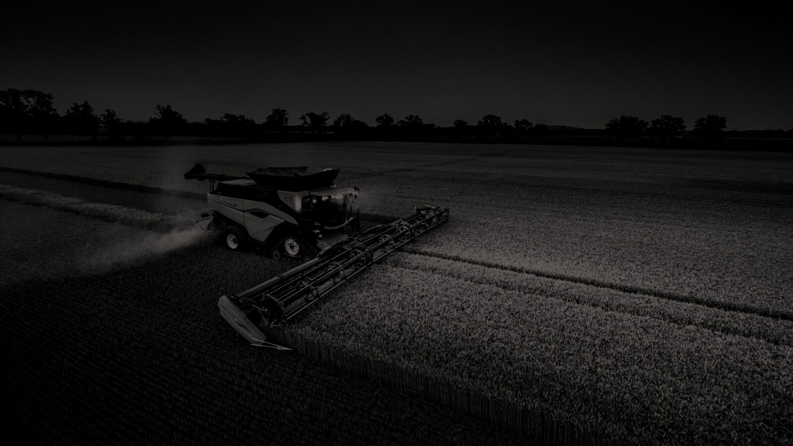 Black and White photo of CR11 combine in a field